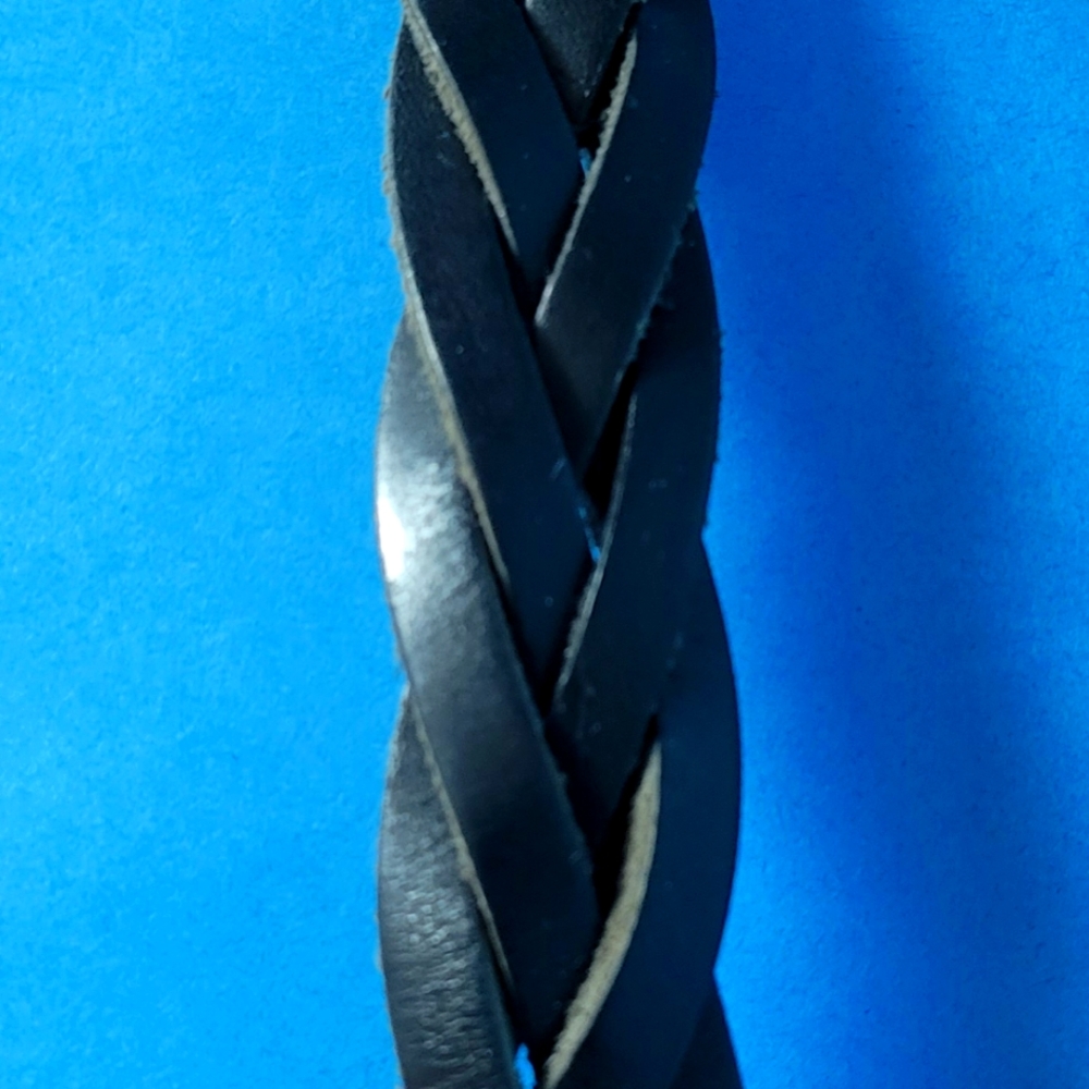 Handmade leather braided cuff bracelet, black with double snap closure.